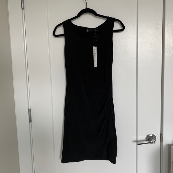 norma kamali ruched stretch-jersey mini dress Norma Kamali Ruched stretch-jersey black mini dress - BOPF main image 1